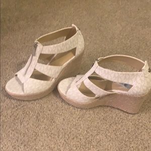 Michael Kors Damita ZIP front wedges.